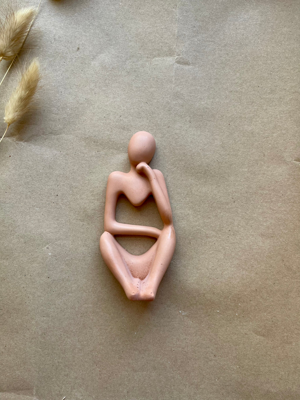 Terracotta thinking gal
