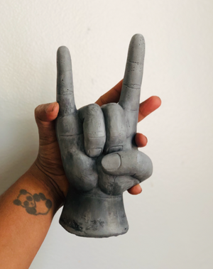Rock On Concrete Hand Sculpture