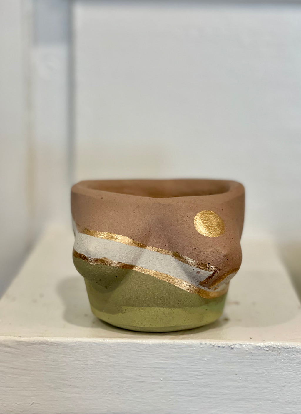 Mini boobs- brown, white, and layers of green